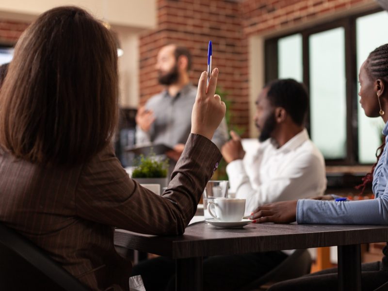 Diverse businesspeople working at management presentation