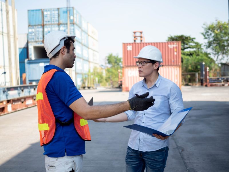 labor employment man male person people human white hardhat helmet safety talk speak discussion grou